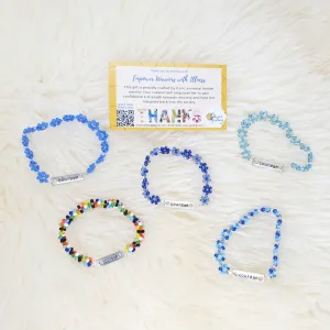 Beaded Bracelet with "Courage" Charm