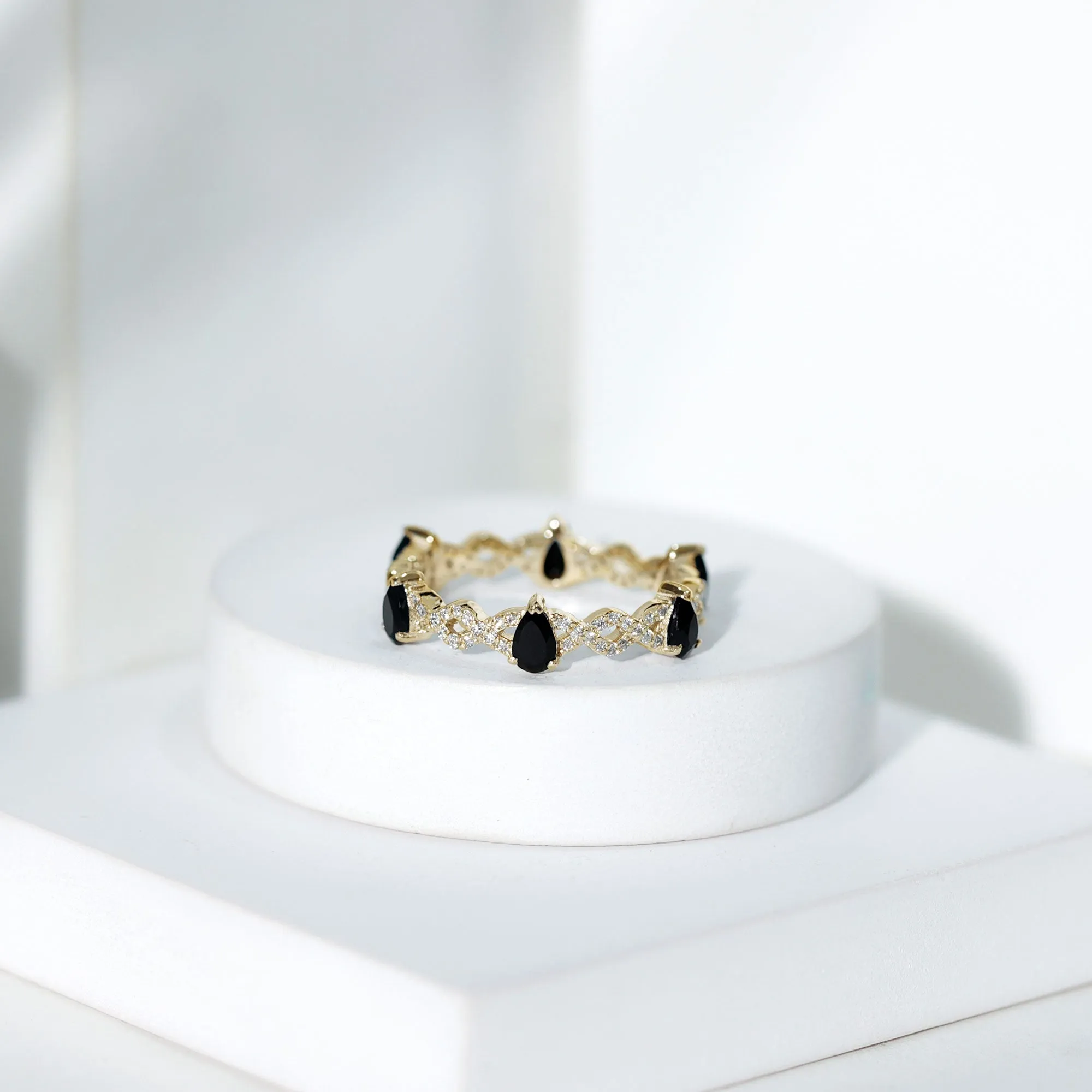 Black Onyx and Diamond Eternity Ring with Crossover Shank