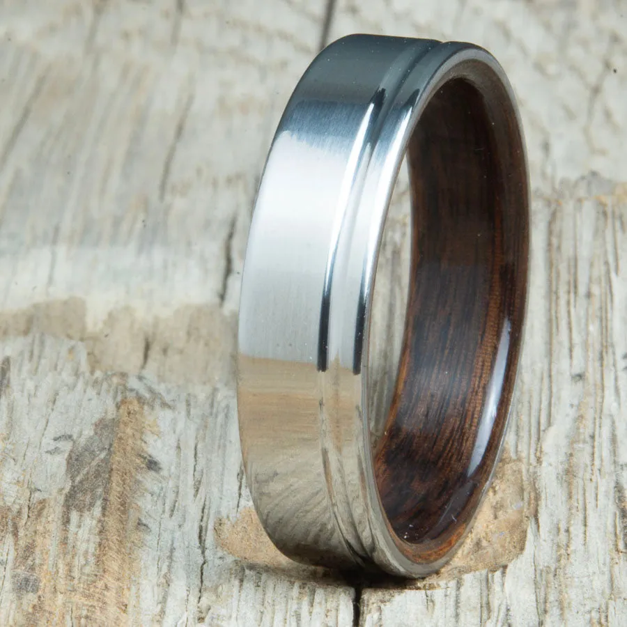 Polished titanium wedding band with Rosewood interior