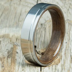 Polished titanium wedding band with Walnut interior