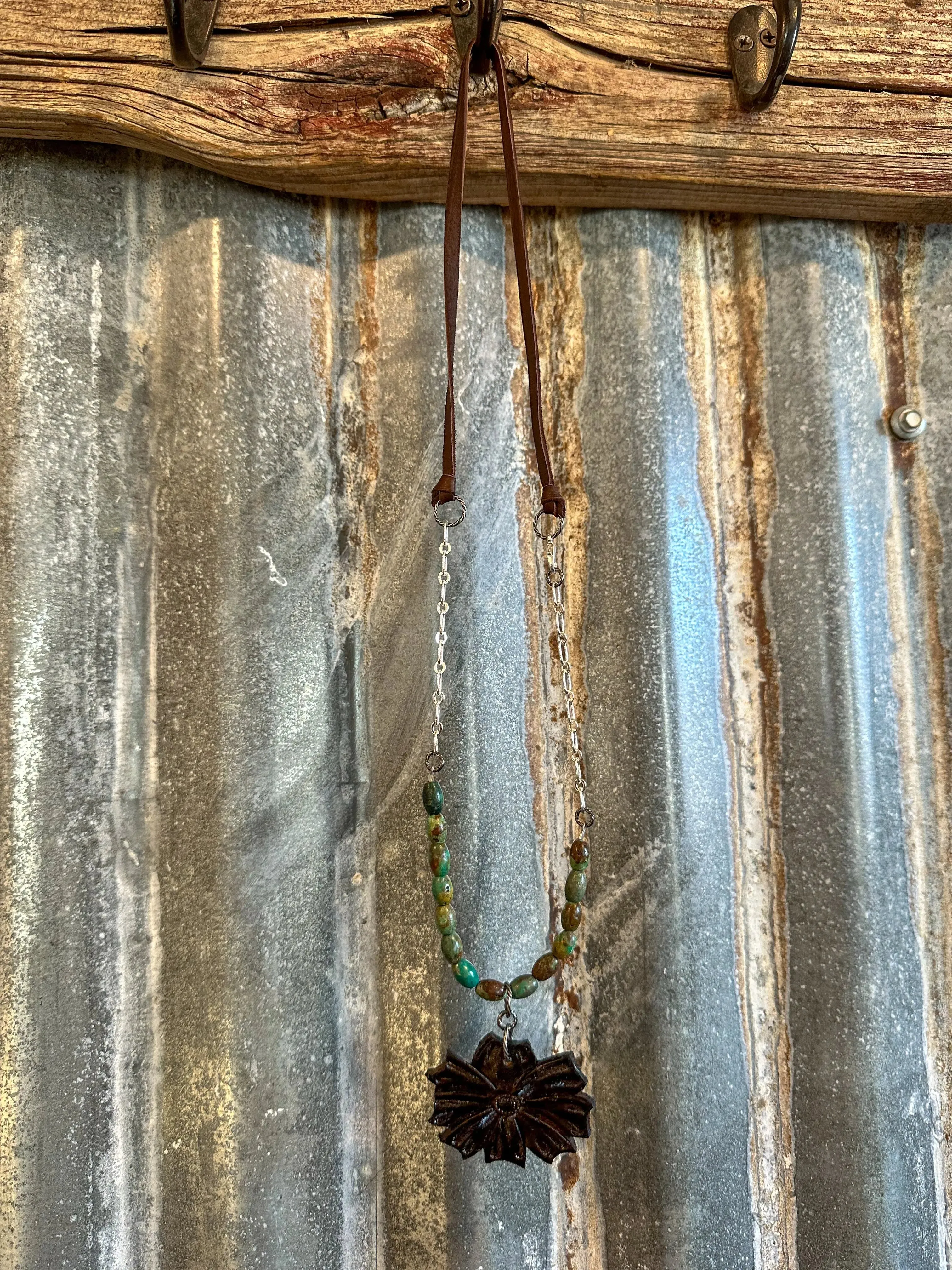 The Mabel Necklace with Green Turquoise Beads and Handtooled Leather Flower Pendant